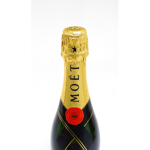 1156 - Four bottles of champagne, comprising a 750ml bottle of Moët & Chandon Imperial brut, a 75cl bottle ... 