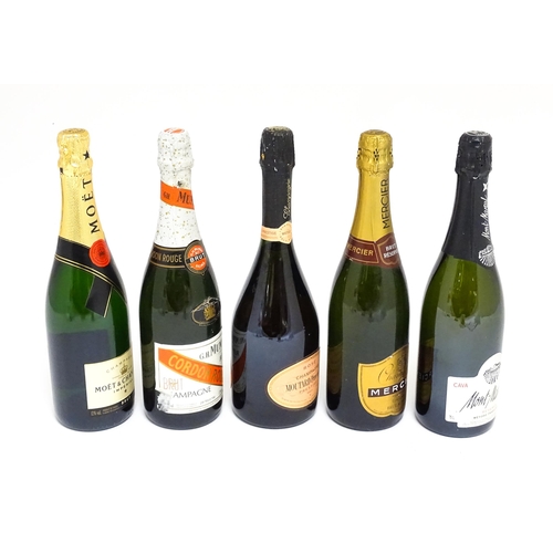 1156 - Four bottles of champagne, comprising a 750ml bottle of Moët & Chandon Imperial brut, a 75cl bottle ... 