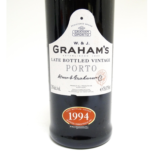 1157 - A 75cl bottle of Graham's late bottled vintage 1994 port and a 75cl bottle of Cockburn's Fine Ruby p... 