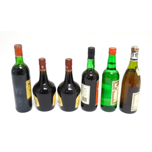 1158 - Six assorted wines and spirits, comprising a 73cl bottle of Château Malartic-Lagravière cru classe d... 