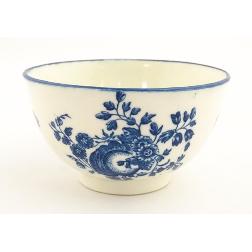 143A - A Caughley blue and white bowl decorated in the Slice Apple and Damson pattern. Marked with S under.... 