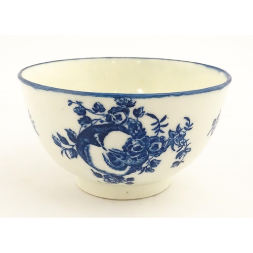 143A - A Caughley blue and white bowl decorated in the Slice Apple and Damson pattern. Marked with S under.... 