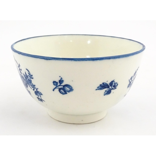 143A - A Caughley blue and white bowl decorated in the Slice Apple and Damson pattern. Marked with S under.... 