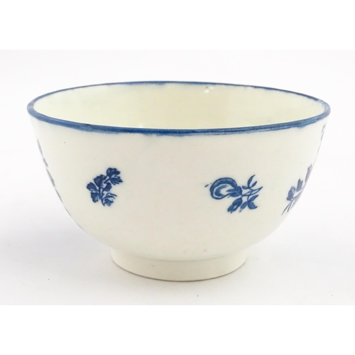 143A - A Caughley blue and white bowl decorated in the Slice Apple and Damson pattern. Marked with S under.... 