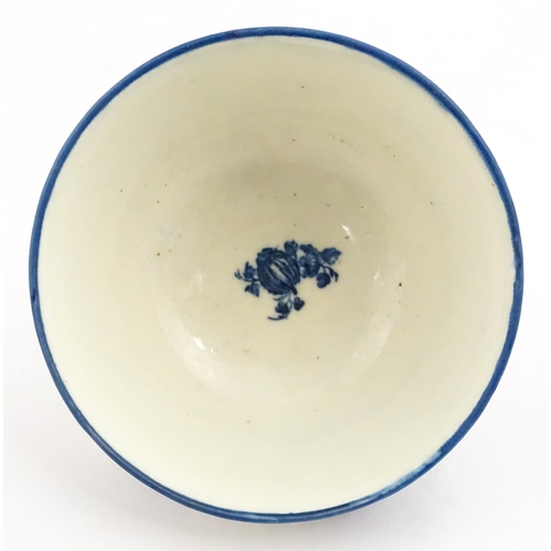 143A - A Caughley blue and white bowl decorated in the Slice Apple and Damson pattern. Marked with S under.... 