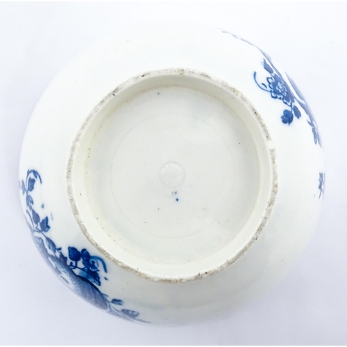 143A - A Caughley blue and white bowl decorated in the Slice Apple and Damson pattern. Marked with S under.... 