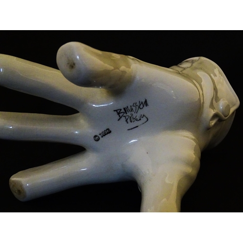 164 - A Leo Bonassera studio pottery novelty vase modelled as a white glove. Marked to underside. Approx. ... 
