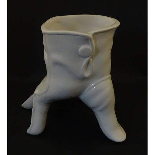 164 - A Leo Bonassera studio pottery novelty vase modelled as a white glove. Marked to underside. Approx. ... 