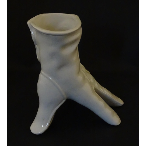 164 - A Leo Bonassera studio pottery novelty vase modelled as a white glove. Marked to underside. Approx. ... 