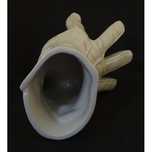164 - A Leo Bonassera studio pottery novelty vase modelled as a white glove. Marked to underside. Approx. ... 