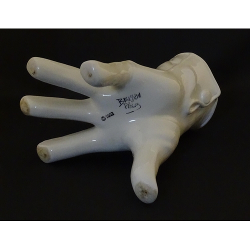164 - A Leo Bonassera studio pottery novelty vase modelled as a white glove. Marked to underside. Approx. ... 