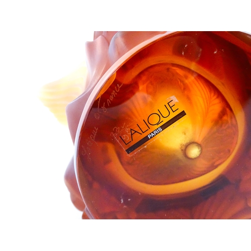 257 - A boxed limited edition Lalique Pivoines glass vase with high relief amber floral base. Limited edit... 