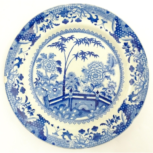 64 - A quantity of Davenport dinner wares in the Bamboo and Peony pattern to include plates and serving d... 