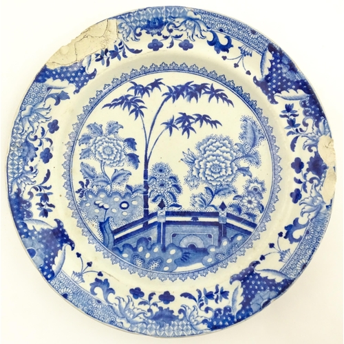 64 - A quantity of Davenport dinner wares in the Bamboo and Peony pattern to include plates and serving d... 