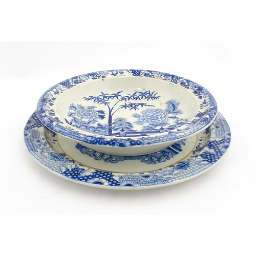 64 - A quantity of Davenport dinner wares in the Bamboo and Peony pattern to include plates and serving d... 