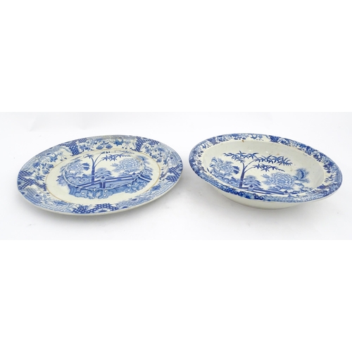 64 - A quantity of Davenport dinner wares in the Bamboo and Peony pattern to include plates and serving d... 