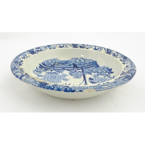 64 - A quantity of Davenport dinner wares in the Bamboo and Peony pattern to include plates and serving d... 