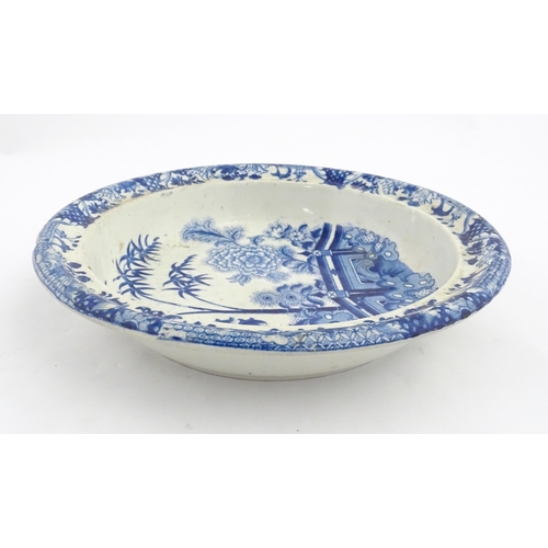 64 - A quantity of Davenport dinner wares in the Bamboo and Peony pattern to include plates and serving d... 