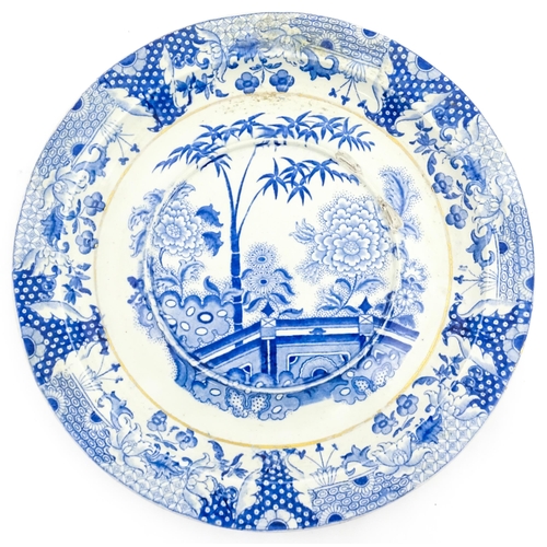 64 - A quantity of Davenport dinner wares in the Bamboo and Peony pattern to include plates and serving d... 