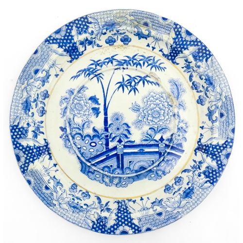 64 - A quantity of Davenport dinner wares in the Bamboo and Peony pattern to include plates and serving d... 