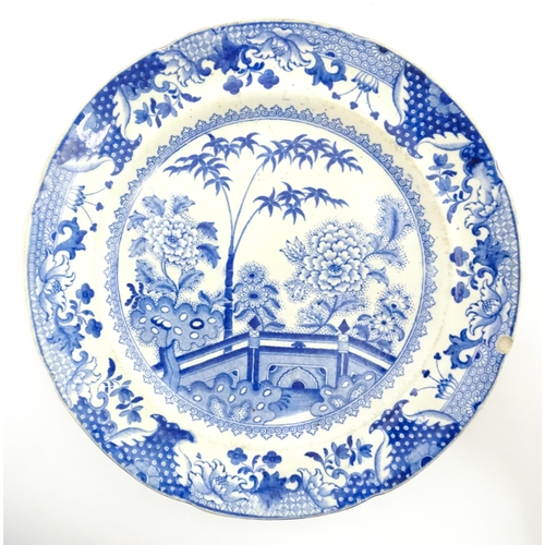 64 - A quantity of Davenport dinner wares in the Bamboo and Peony pattern to include plates and serving d... 