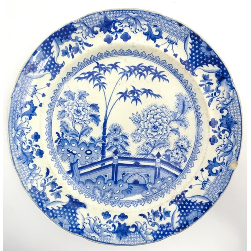 64 - A quantity of Davenport dinner wares in the Bamboo and Peony pattern to include plates and serving d... 