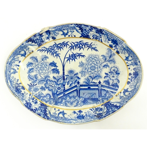 64 - A quantity of Davenport dinner wares in the Bamboo and Peony pattern to include plates and serving d... 