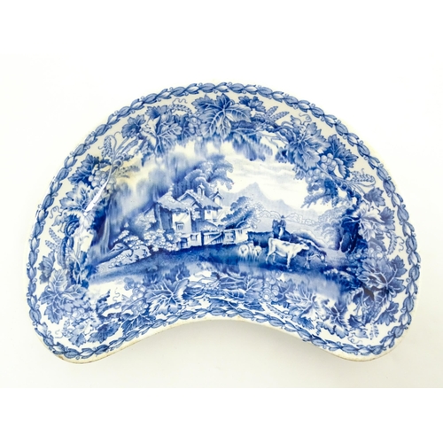 79 - Three items of blue and white comprising an oval plate marked Pratts Native Scenery, a crescent shap... 