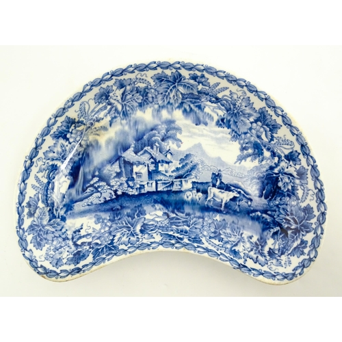 79 - Three items of blue and white comprising an oval plate marked Pratts Native Scenery, a crescent shap... 