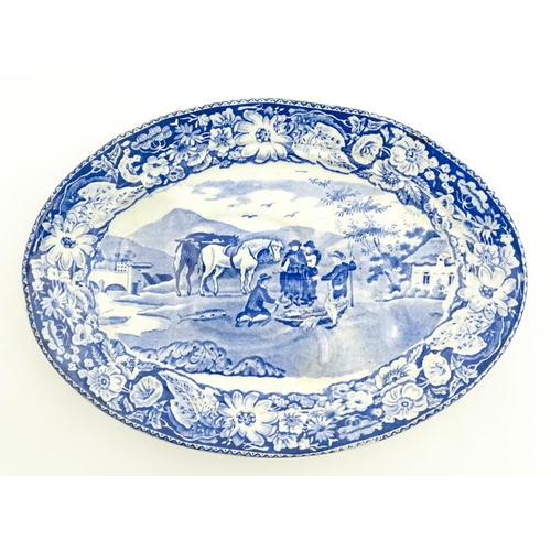 79 - Three items of blue and white comprising an oval plate marked Pratts Native Scenery, a crescent shap... 