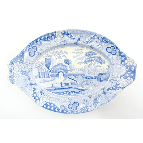 80 - Four assorted blue and white dishes to include a Copeland & Garrett dish of oval form with castle de... 