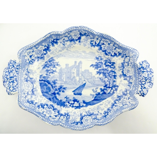 80 - Four assorted blue and white dishes to include a Copeland & Garrett dish of oval form with castle de... 