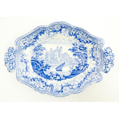 80 - Four assorted blue and white dishes to include a Copeland & Garrett dish of oval form with castle de... 