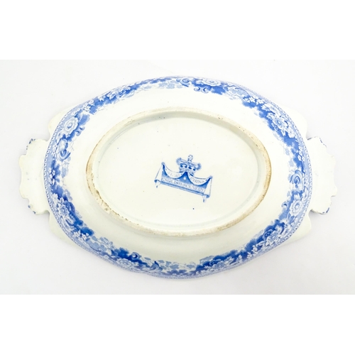 80 - Four assorted blue and white dishes to include a Copeland & Garrett dish of oval form with castle de... 