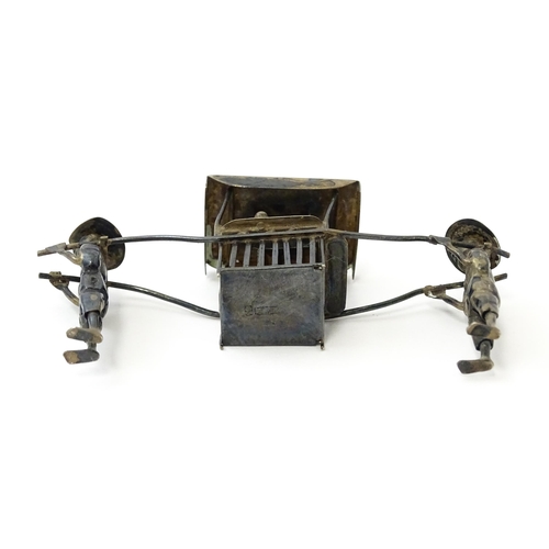 397 - A Chinese export silver model of two figures carrying a sedan chair. Marked with Oriental character ... 