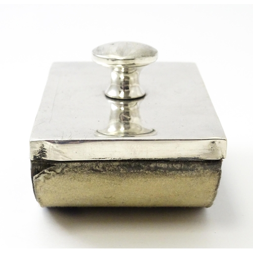 403 - A silver mounted desk blotter, hallmarked Birmingham 1933, maker Sanders & Mackenzie. Approx. 4 1/4