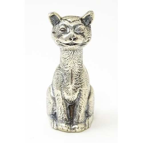 406 - A silver model of a seated cat hallmarked Birmingham 1911, maker possibly Philip Hanson Abbot. Appro... 