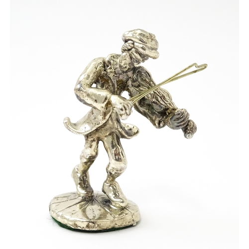 408 - A white metal model of a man playing the fiddle in the manner of Ben Zion. Approx. 2 3/4