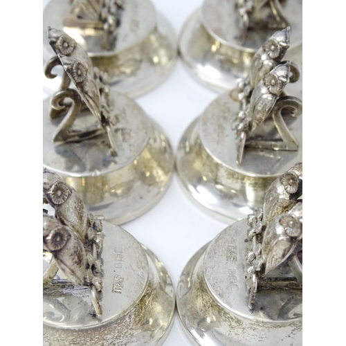 411 - A cased set of six novelty silver owl menu / place card holders, modelled as a pair of owls, hallmar... 