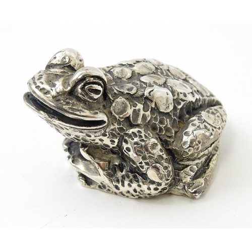 416 - A silver model of a toad. Approx. 1