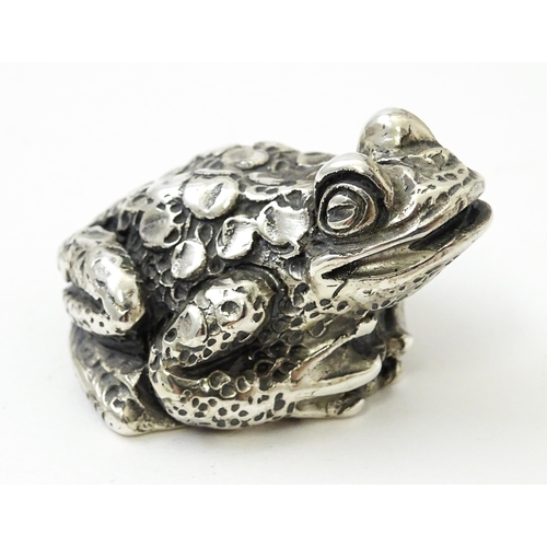 416 - A silver model of a toad. Approx. 1