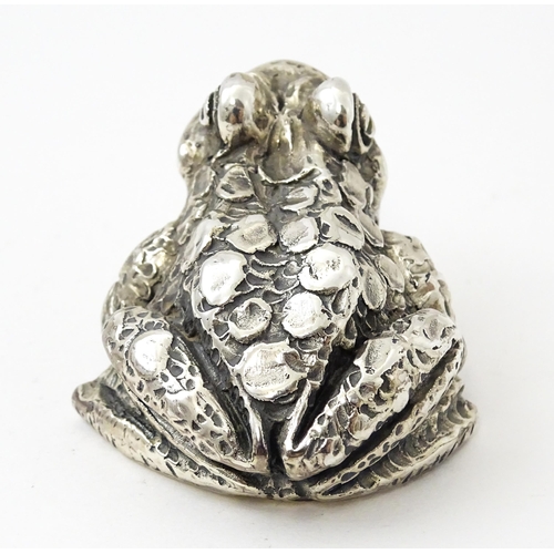 416 - A silver model of a toad. Approx. 1