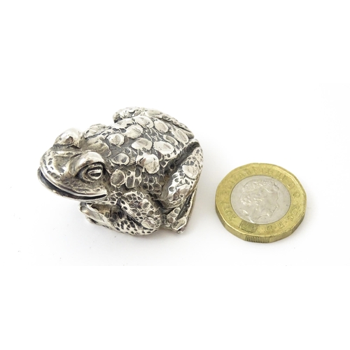 416 - A silver model of a toad. Approx. 1