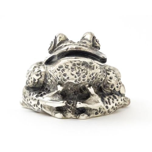 416 - A silver model of a toad. Approx. 1