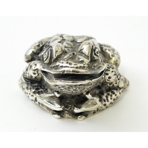 416 - A silver model of a toad. Approx. 1