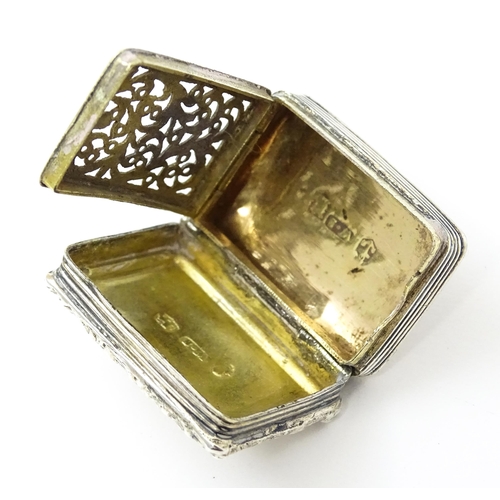 421 - A George IV silver vinaigrette opening to reveal a gilded interior with grille, hallmarked Birmingha... 