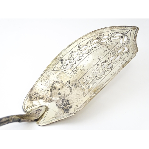 425 - An Irish silver fish slice with engraved decoration and engraved armorials to handle hallmarked Dubl... 