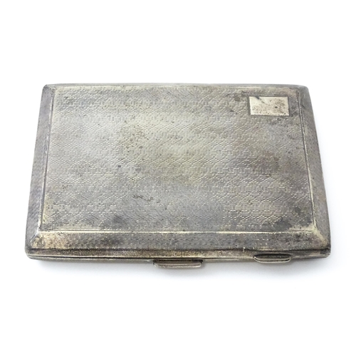 427 - An Art Deco silver cigarette case with engine turned decoration hallmarked Chester 1928, maker E. J ... 