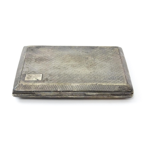 427 - An Art Deco silver cigarette case with engine turned decoration hallmarked Chester 1928, maker E. J ... 