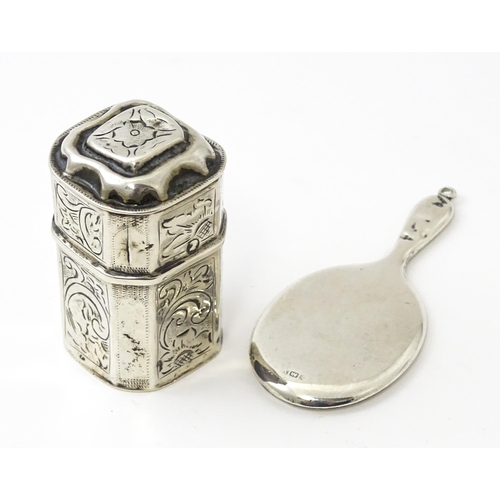 430 - A 19thC Dutch silver peppermint box with engraved decoration, c. 1868. Together with a miniature / c... 